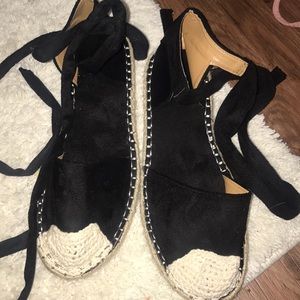 Flat black wrap around espadrilles
